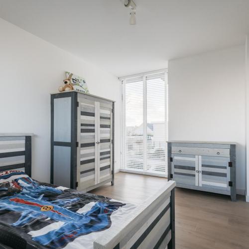 Uitbreiding boven op woning