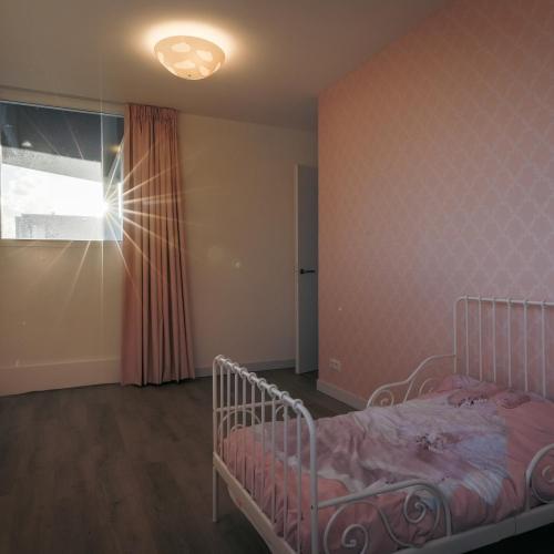 Uitbreiding boven op woning